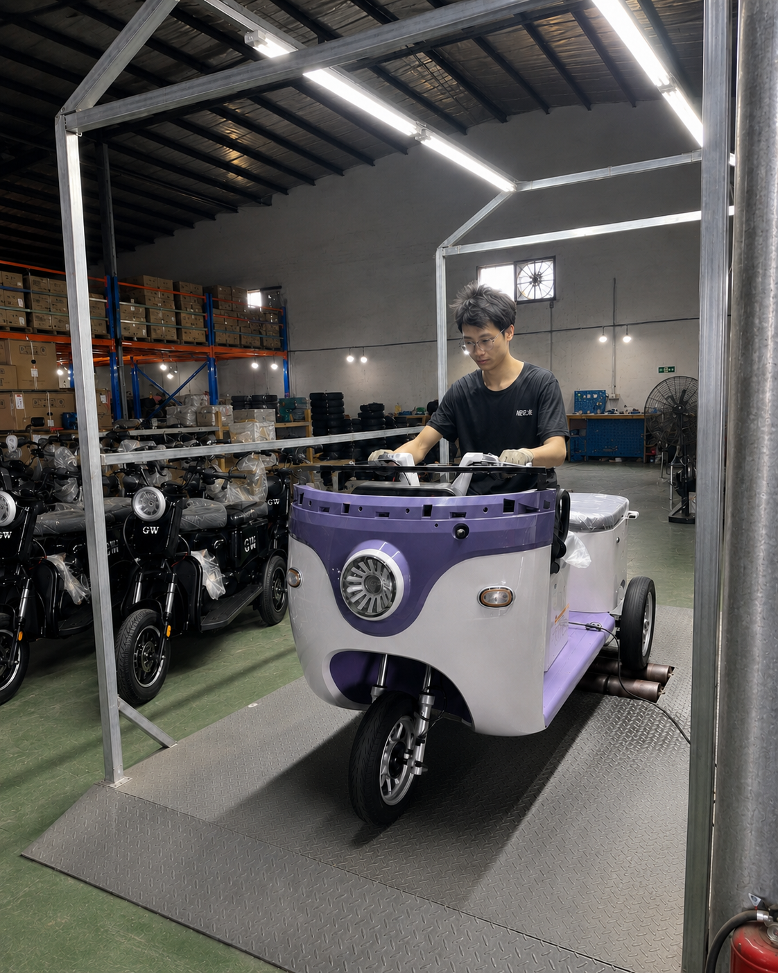 Electric tricycle undergoing functional inspection at a testing station